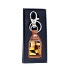 Load image into Gallery viewer, Keychain decorated with amber mosaic
