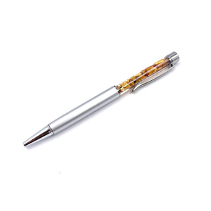 Pen with amber pieces