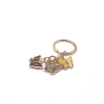 Load image into Gallery viewer, Keychain &quot;Butterflies” decorated with amber mosaic
