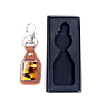 Load image into Gallery viewer, Keychain decorated with amber mosaic
