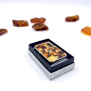 Lighter decorated with amber mosaic