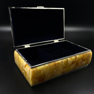 Amber jewelry box decorated with amber mosaic