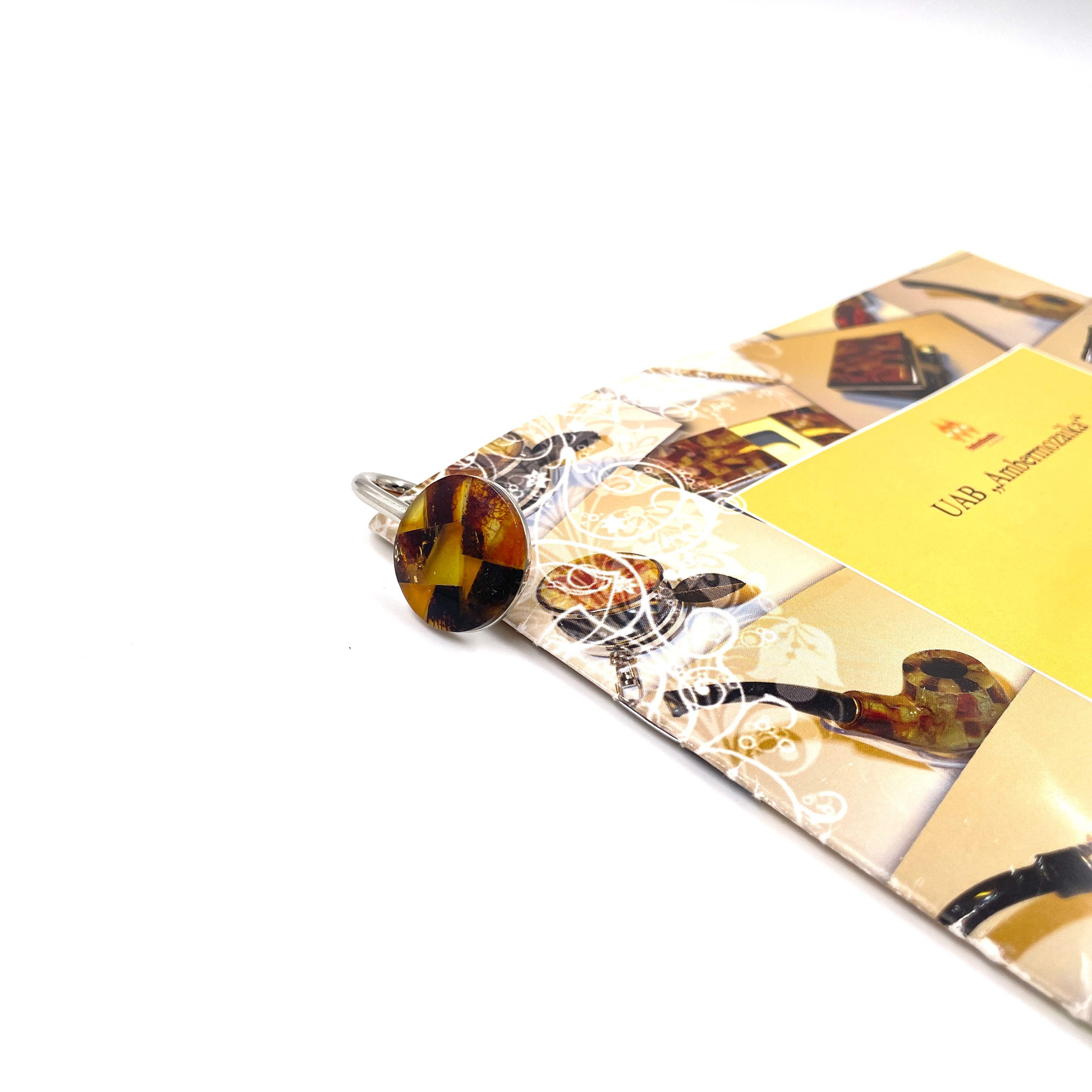 Book tab decorated with amber mosaic