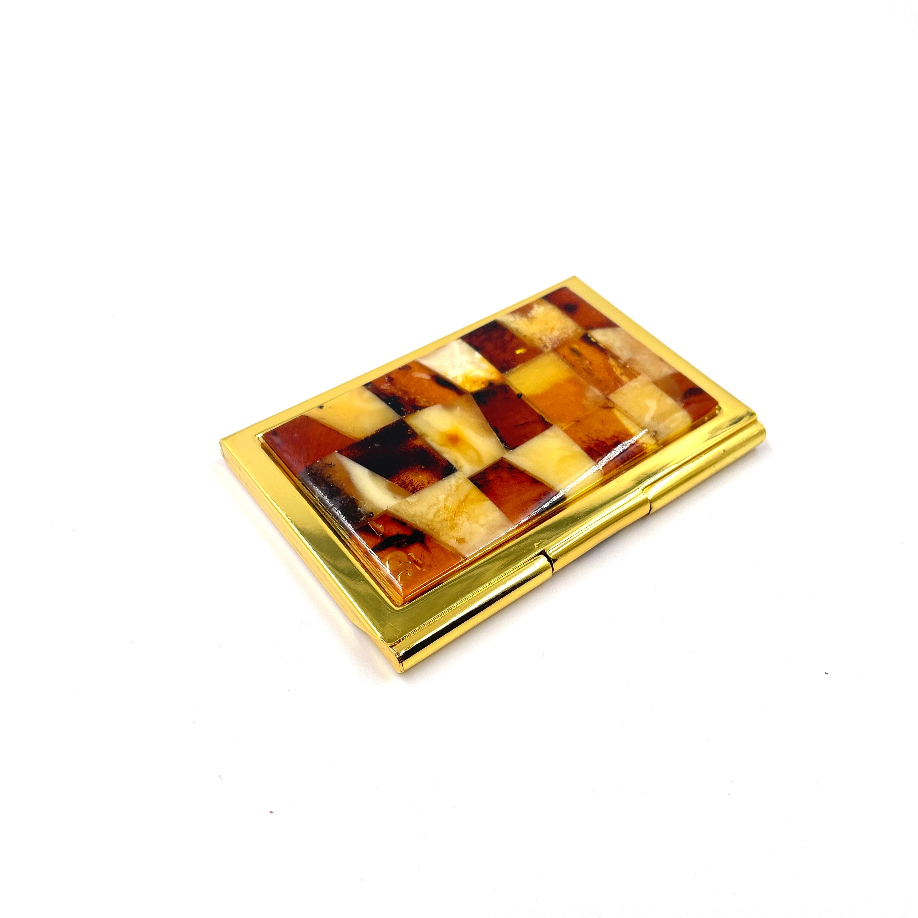 Business card holder decorated with amber mosaic