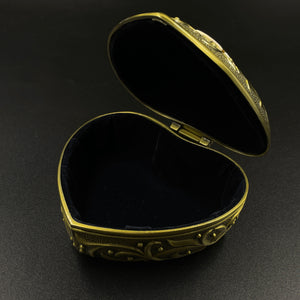 Heart-shaped jewelry box decorated with amber