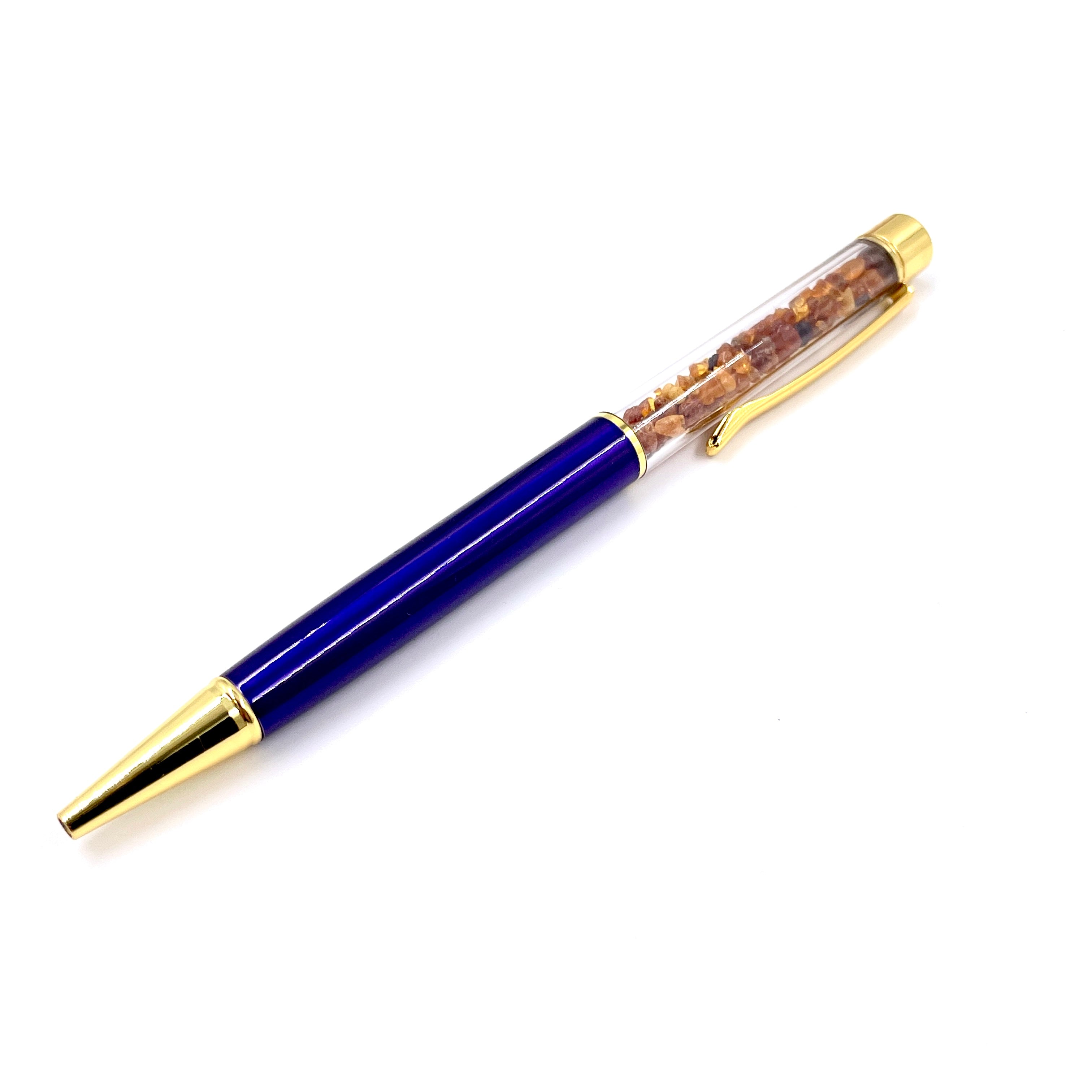 A Pen with Amber Pieces