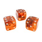 Baltic amber playing dice in natural honey and cognac colors