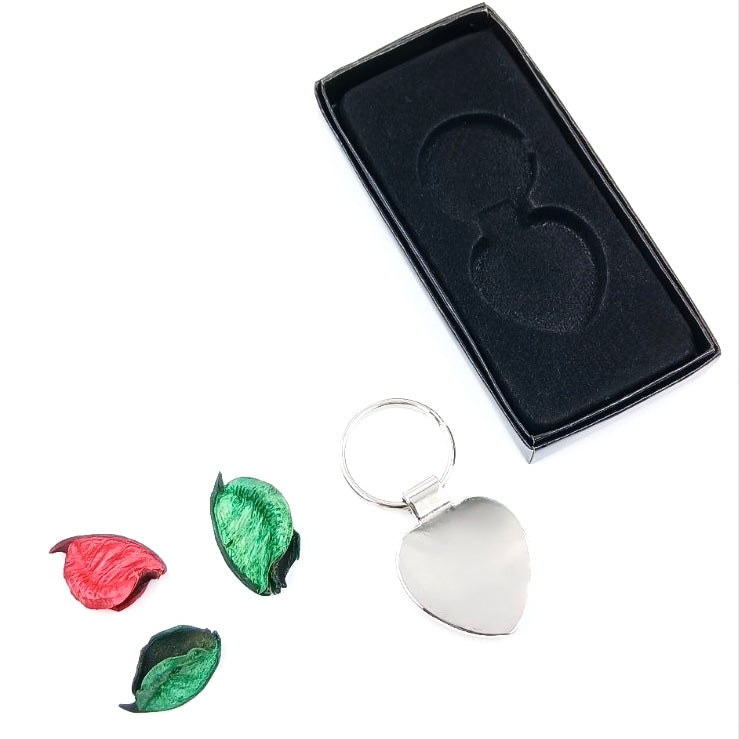 Heart-shaped Baltic amber keychain with warm golden tones - romantic gift accessory from Lithuania