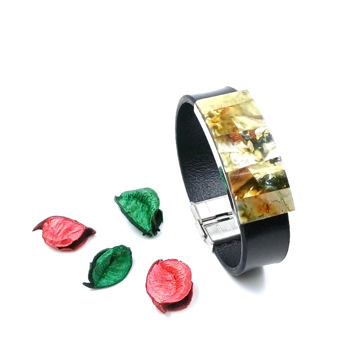  Luxury wide leather bracelet with distinctive pattern featuring green and white Baltic amber accents