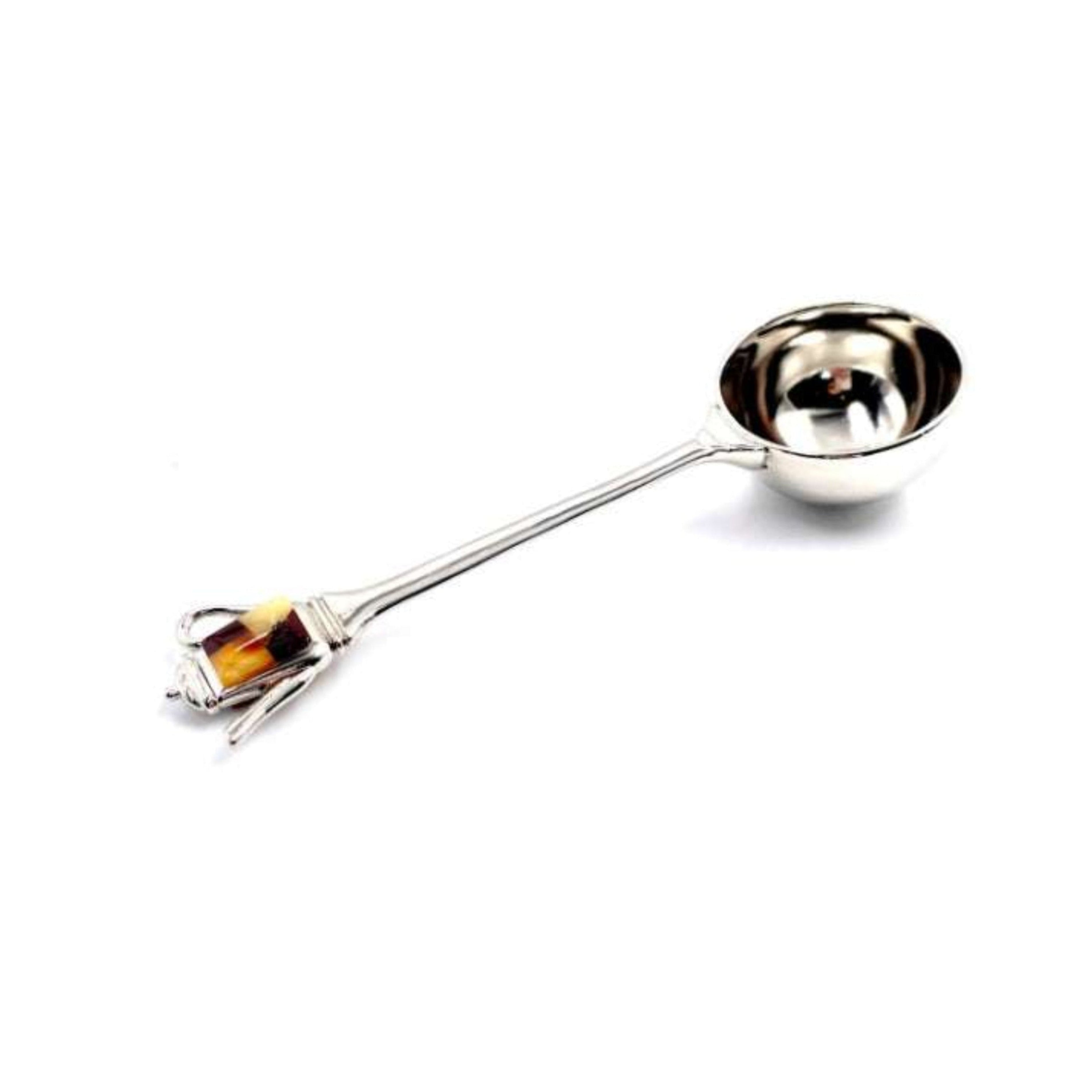 Spoon for coffe decorared with amber mixed mozaica