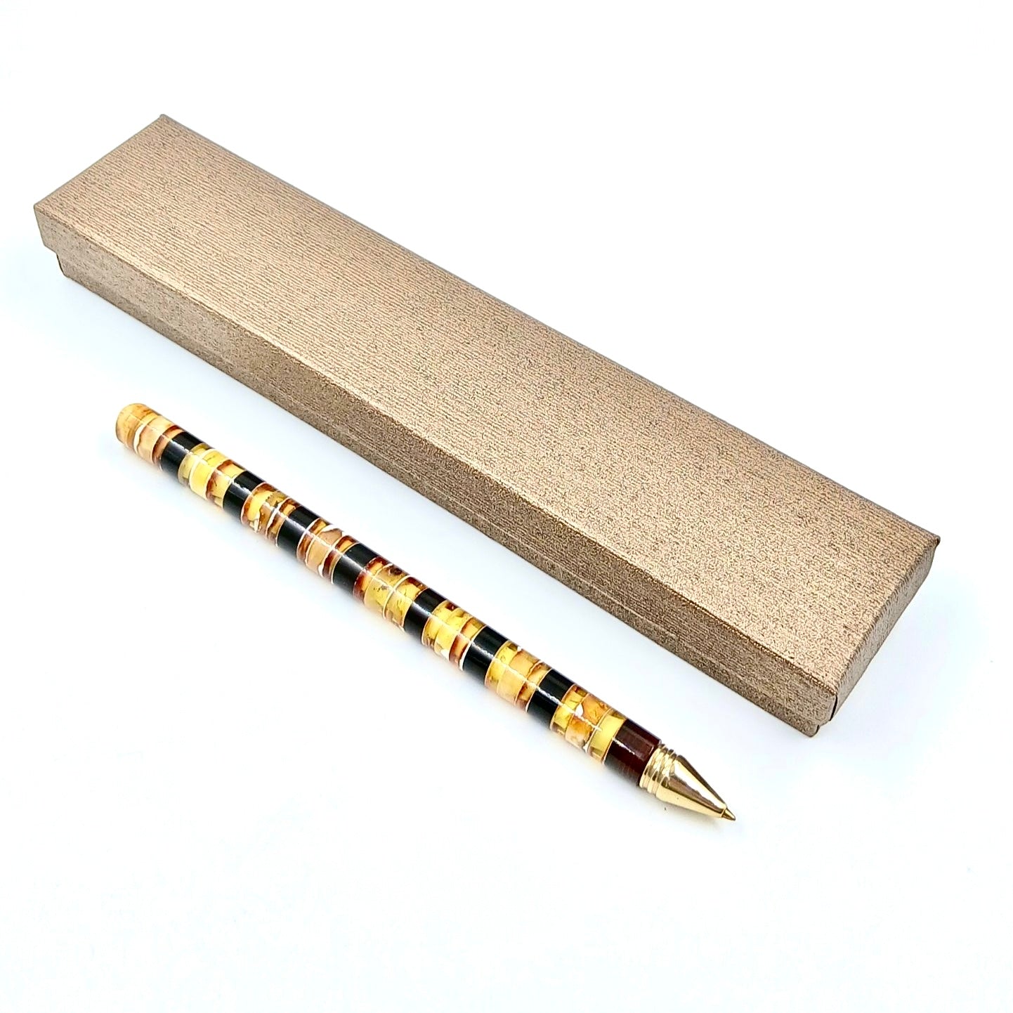 Unique Baltic amber pen, ideal for gifting or desk display.
