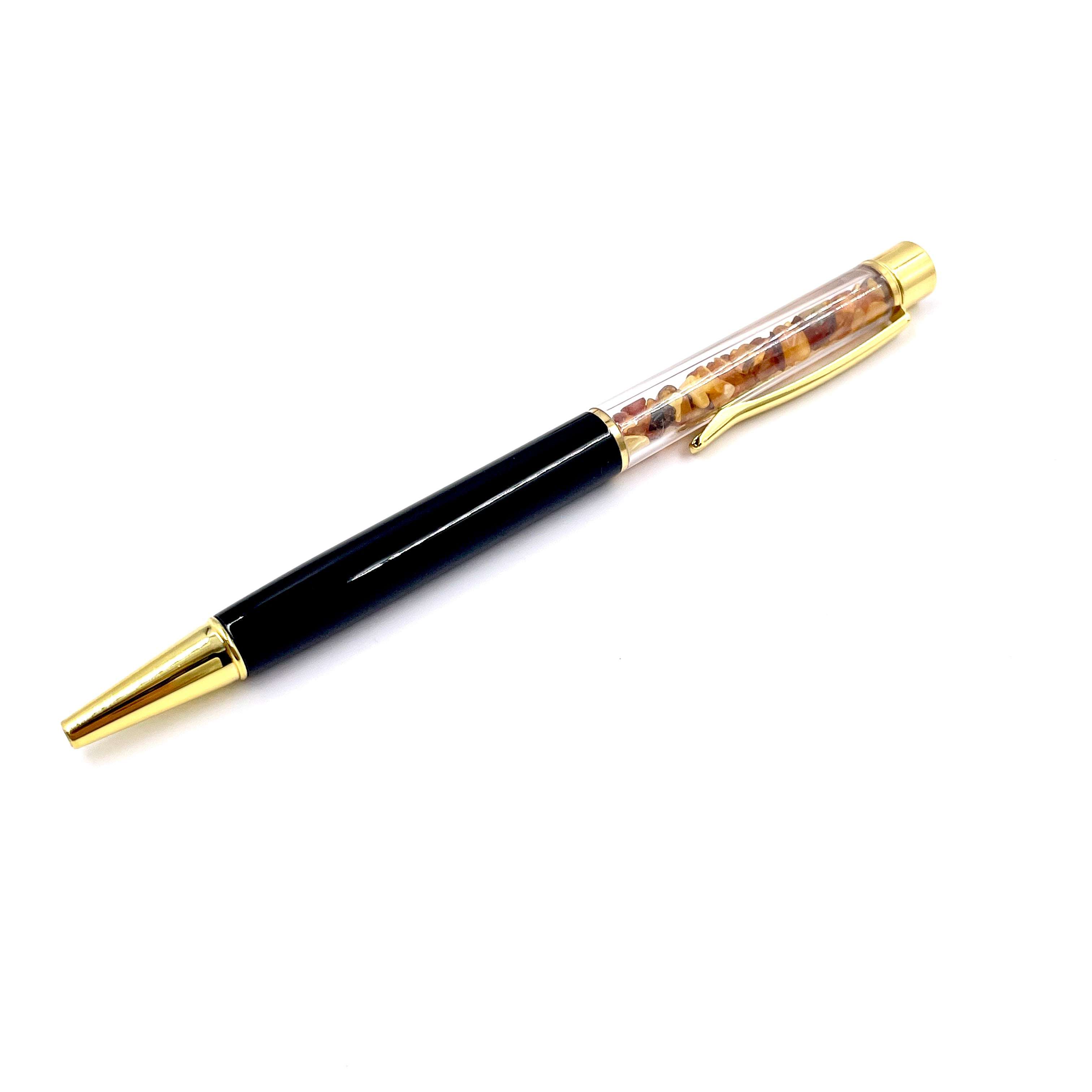 black pen filled with orange light amber golden plated
