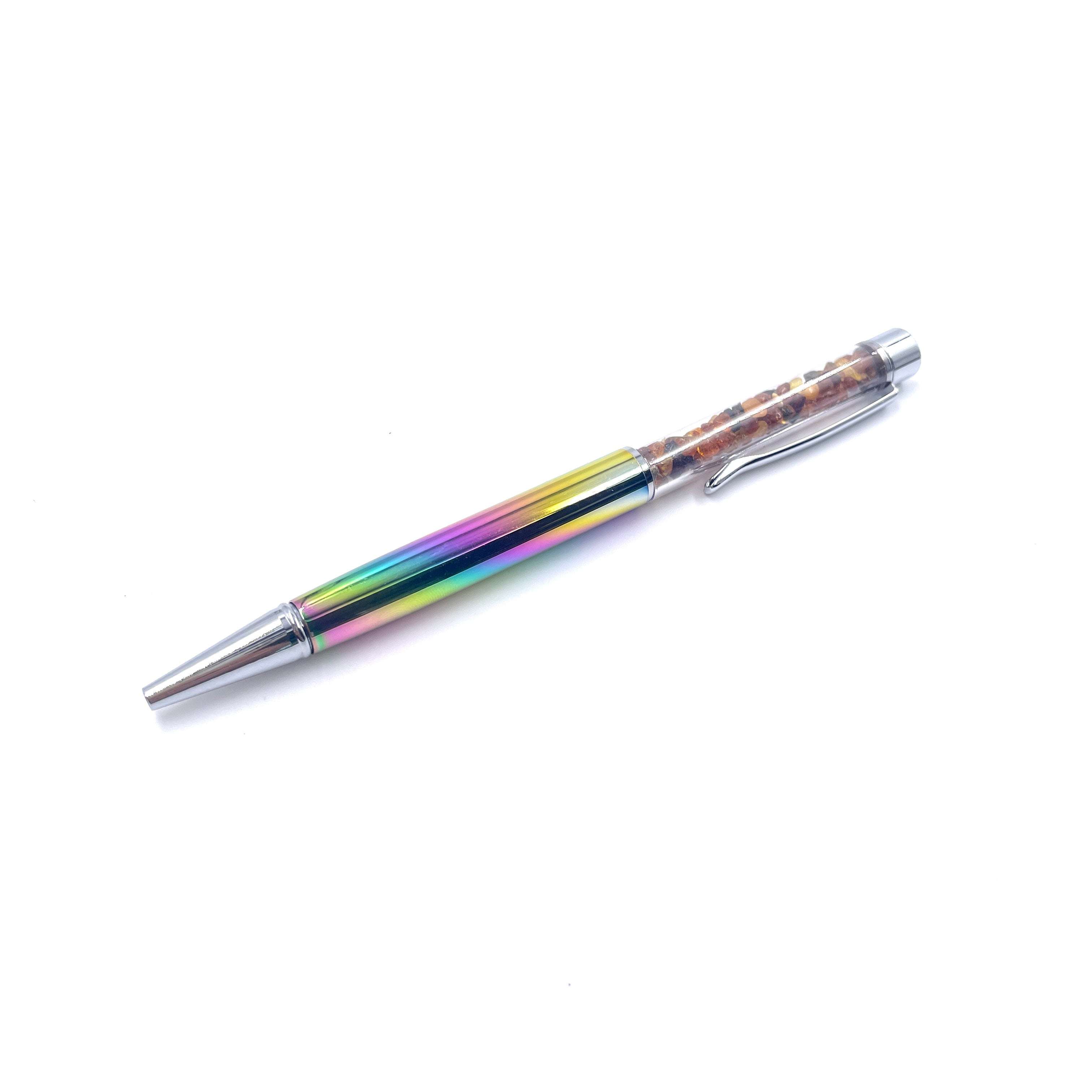 colorful and silver plated pen filled with amber