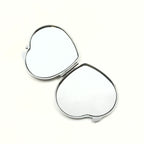 Heart-Shaped Compact Mirror With a Silver Frame
