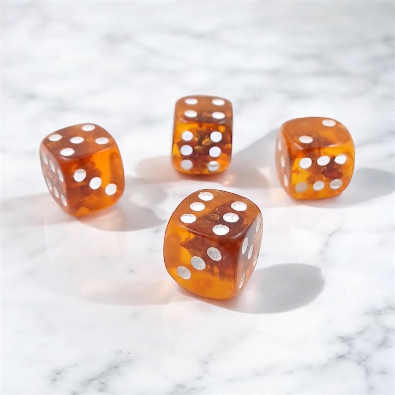 Handcrafted Baltic amber playing dice made from natural gemstone