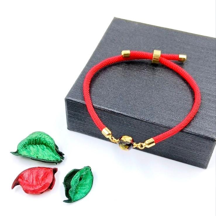 Artisan-made cord bracelets featuring genuine Baltic amber beads