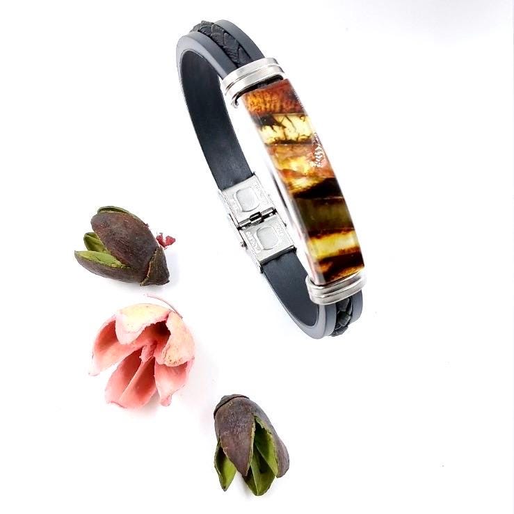 Modern silicone bracelet featuring natural mixed Baltic amber and leather