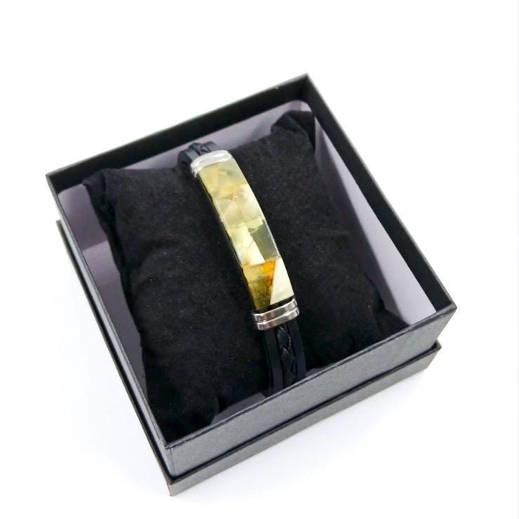 Modern silicone bracelet with leather and stainless steel details