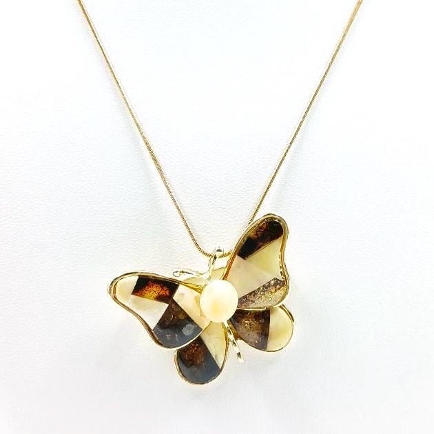 Handcrafted necklace that converts into a brooch, decorated with amber mosaic