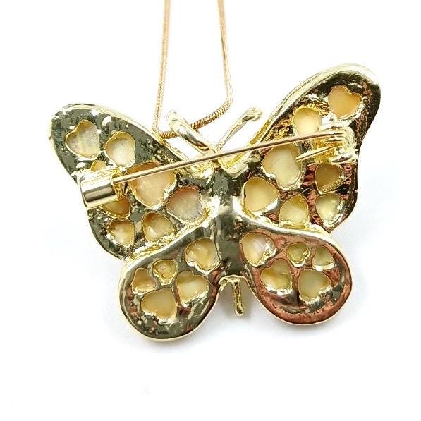Statement necklace that can be worn as a brooch, featuring amber mosaic