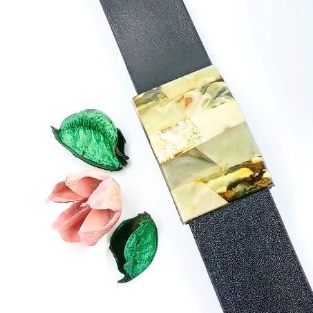 Genuine leather bracelet featuring natural Baltic amber handmade in Lithuania
