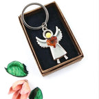 Handcrafted angel keychain with natural Baltic amber and stainless steel