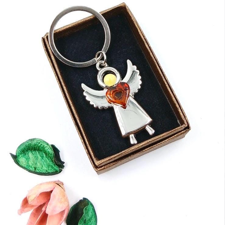 Handcrafted angel keychain with natural Baltic amber and stainless steel