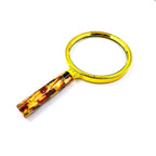 golden edged glass with amber mozaic to view object close up and for people with bad sight