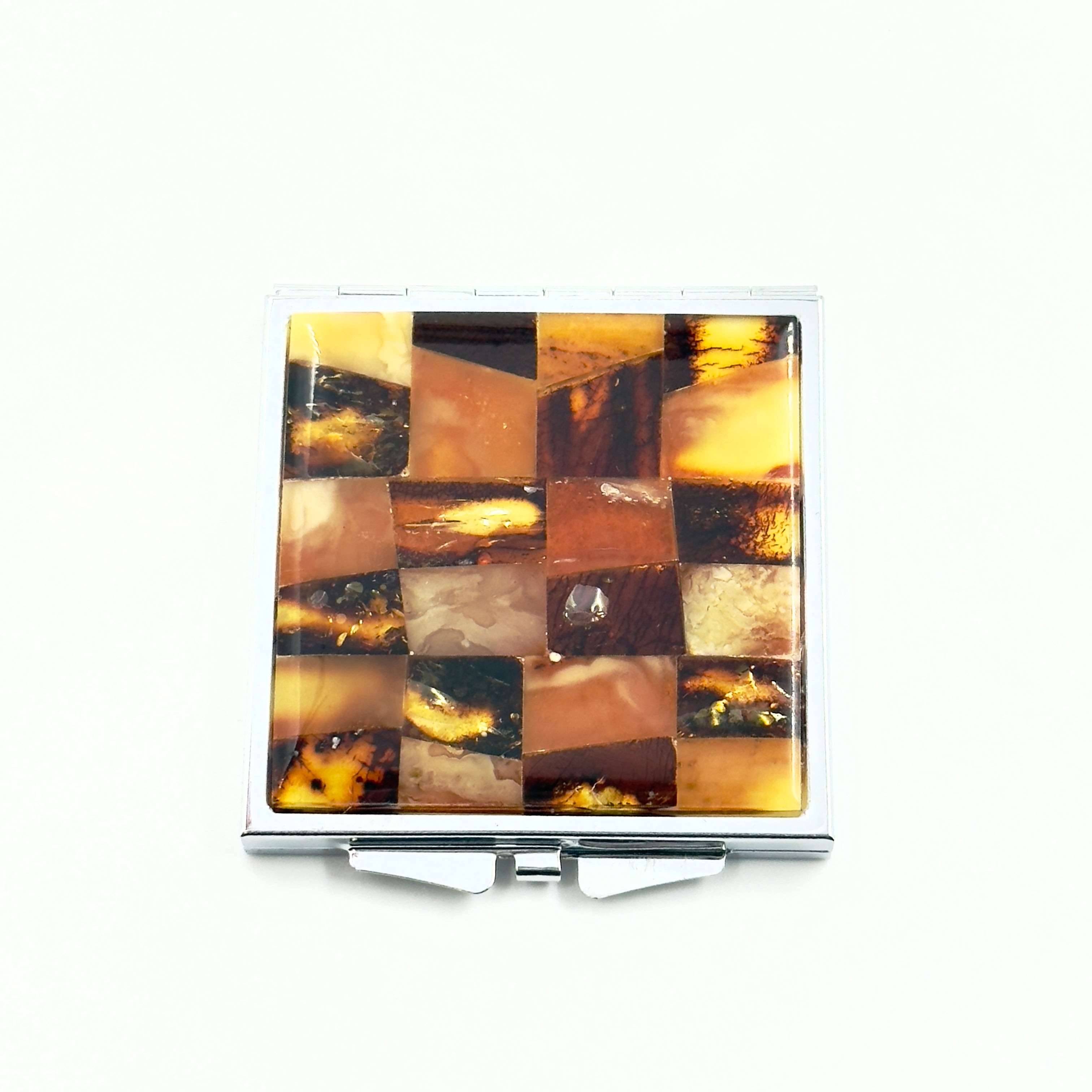 Amber mosaic mirror with mixed color amber pieces
