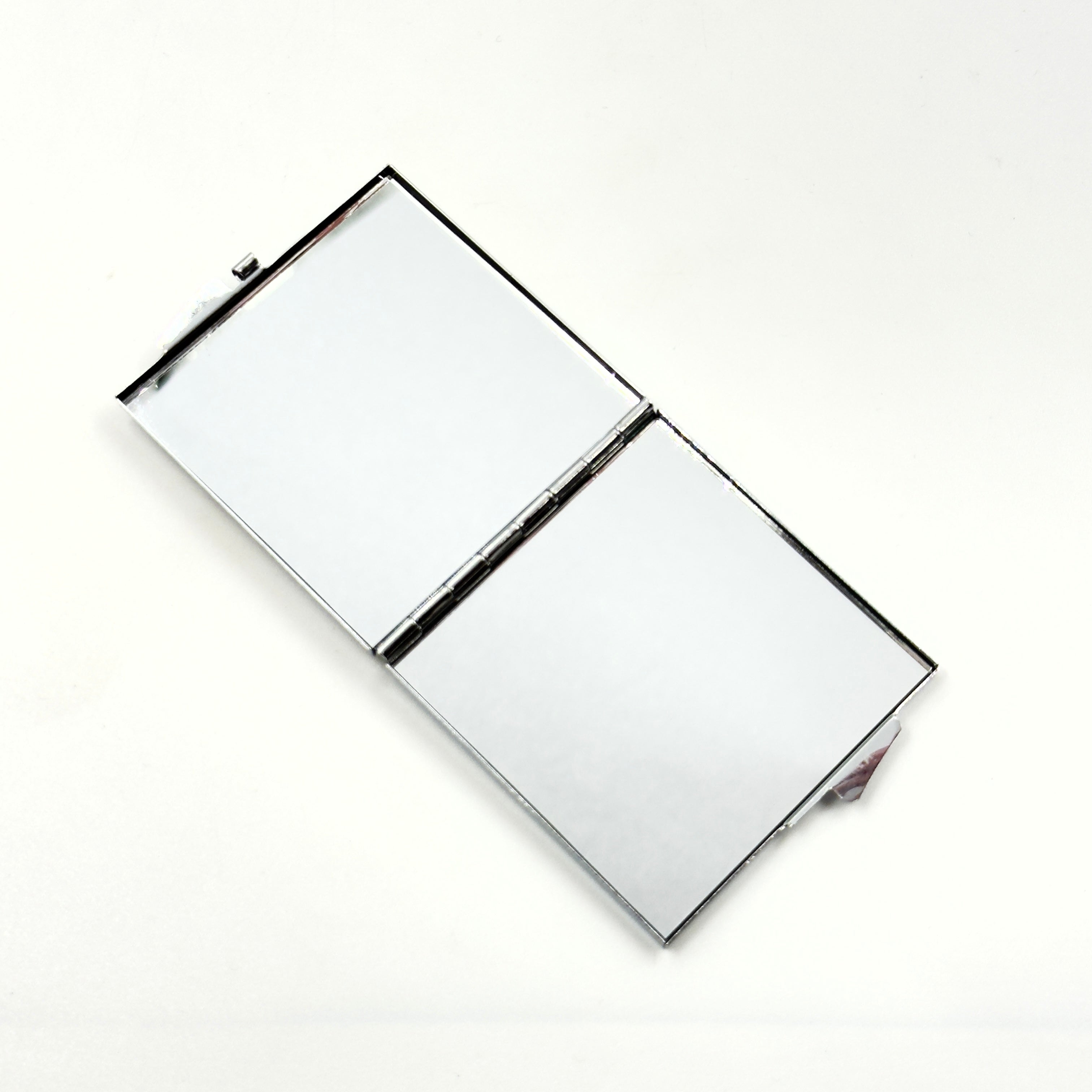 Mixed amber decorative hand mirror made in Lithuania