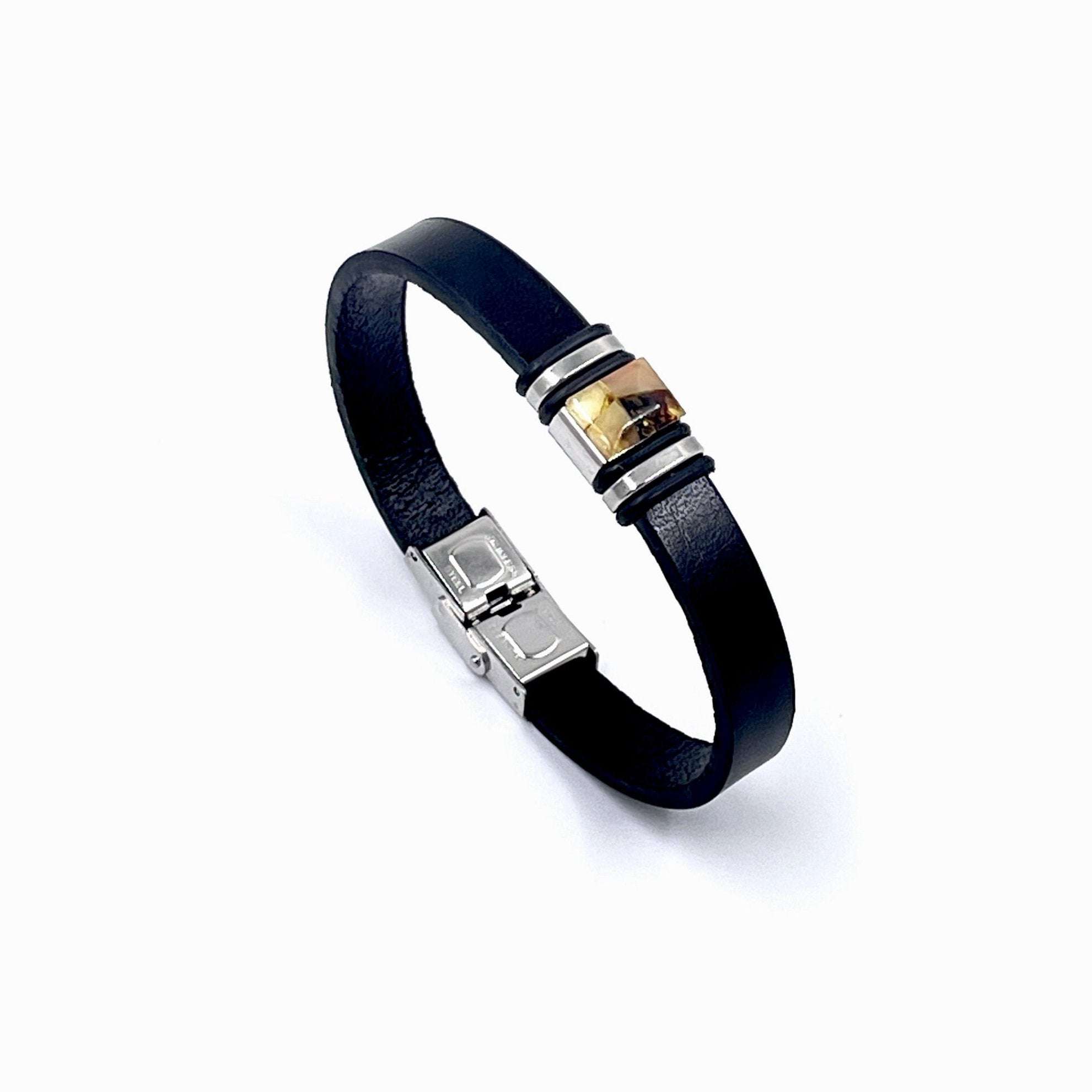 A Black Leather Bracelet with a Silver Clasp and a Small Amber
