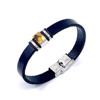 A Black Leather Bracelet with a Silver Clasp and a Small Amber Stone