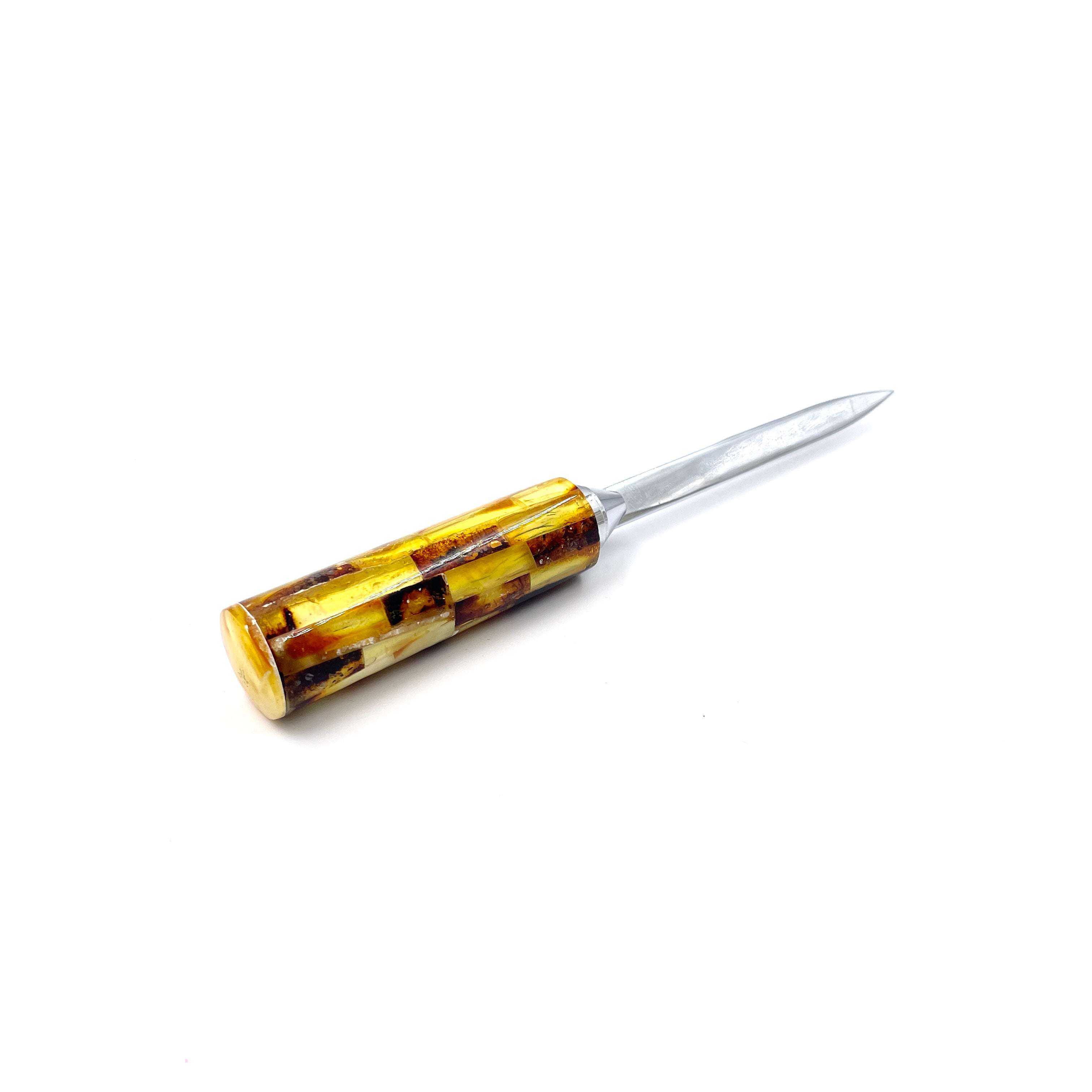 A Letter Opener with a Handle Made of Natural Baltic Amber, Featuring a Geometric Pattern